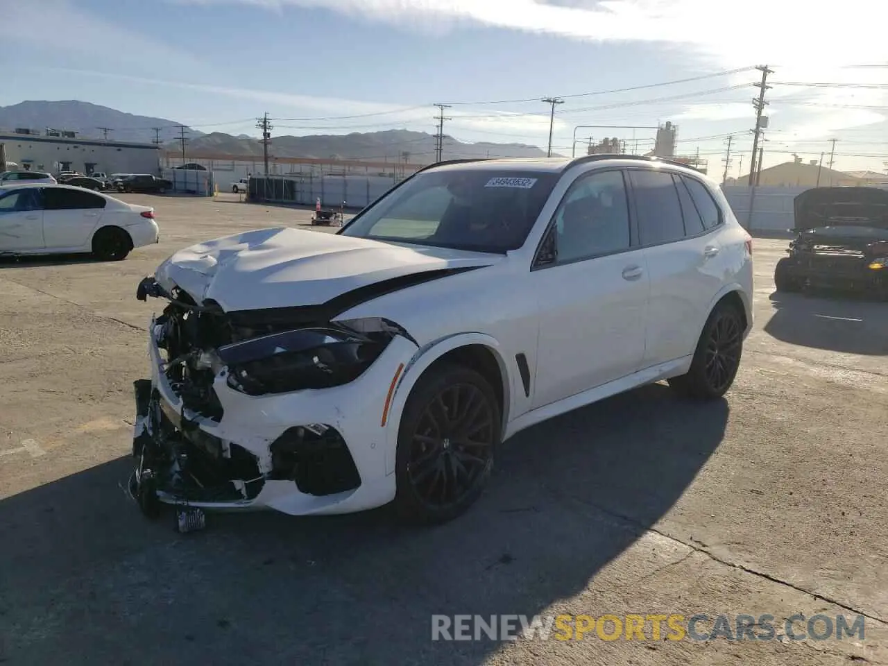 2 fotografías del automóvil dañado 5UXCR4C0XM9H71932 BMW X5 2021