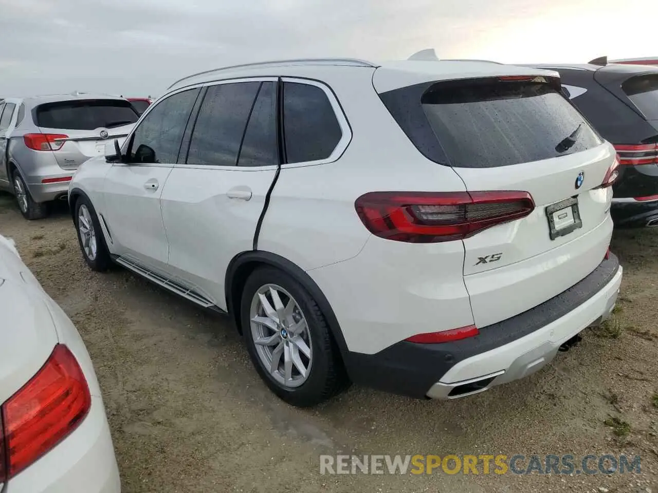 2 fotografías del automóvil dañado 5UXCR6C05M9G27913 BMW X5 2021