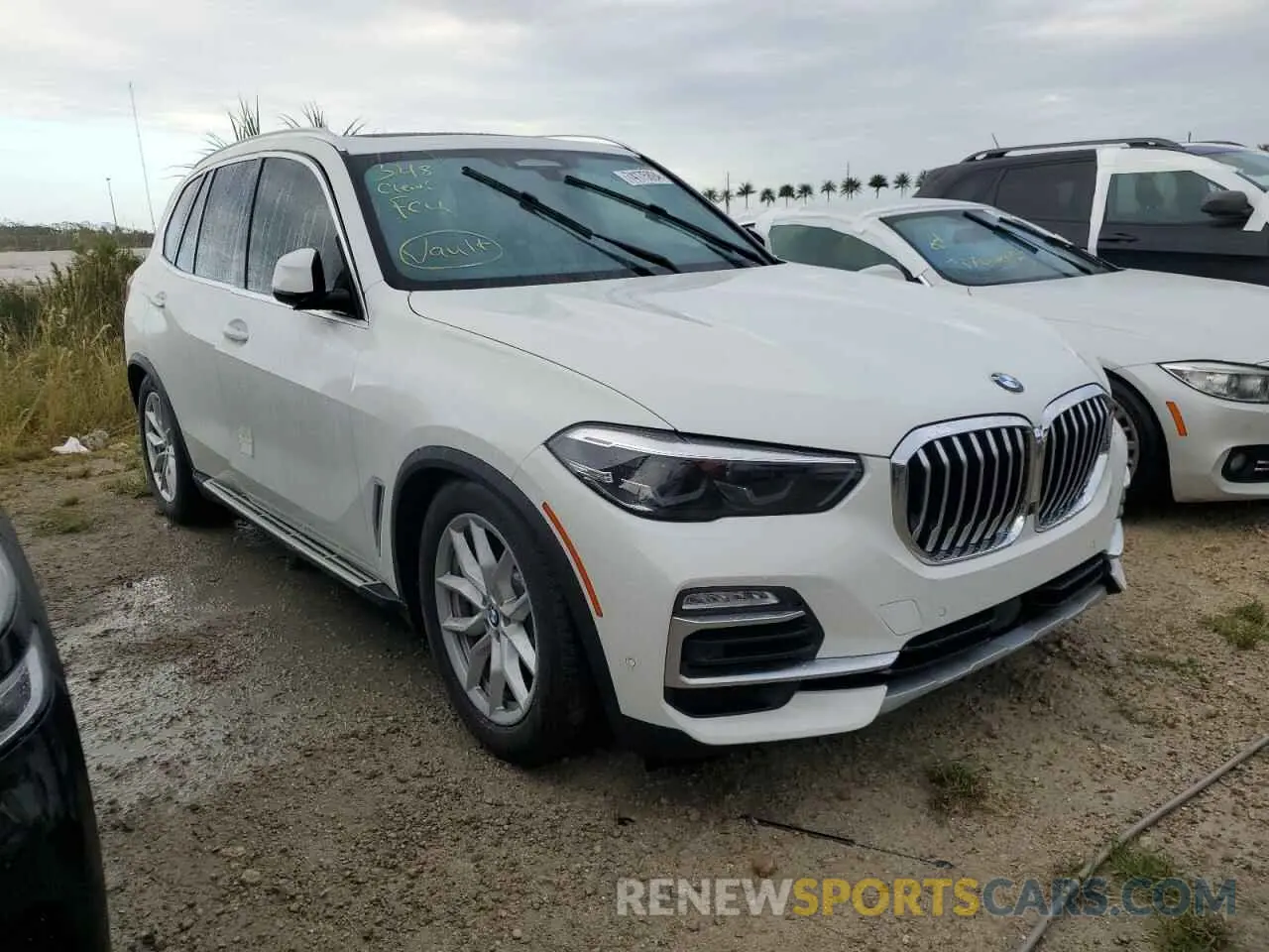 4 fotografías del automóvil dañado 5UXCR6C05M9G27913 BMW X5 2021