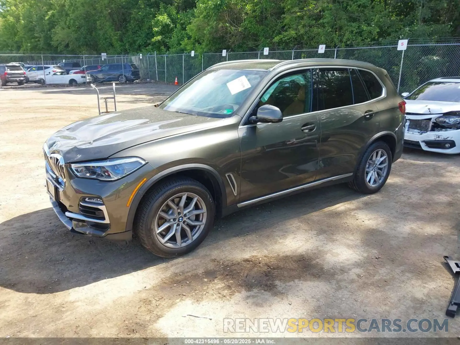2 fotografías del automóvil dañado 5UXCR6C06M9G21960 BMW X5 2021