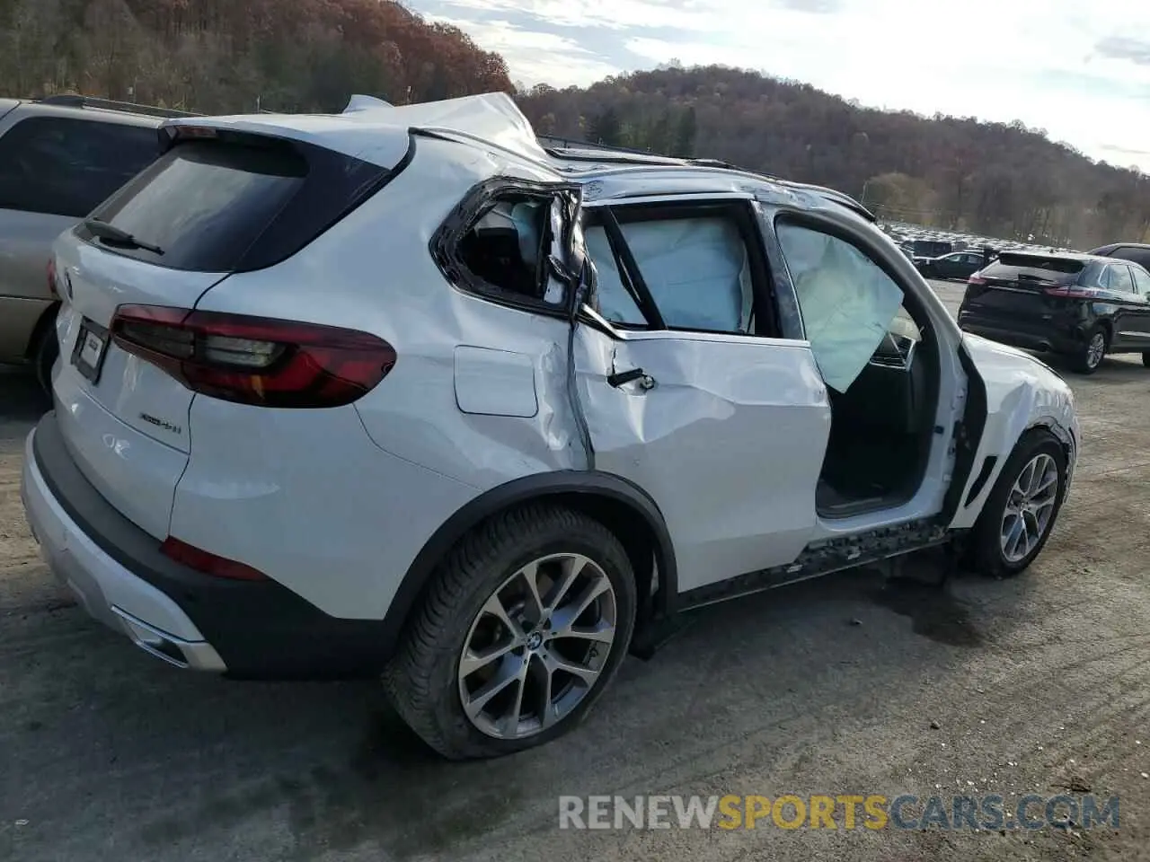 3 fotografías del automóvil dañado 5UXCR6C08M9F23416 BMW X5 2021