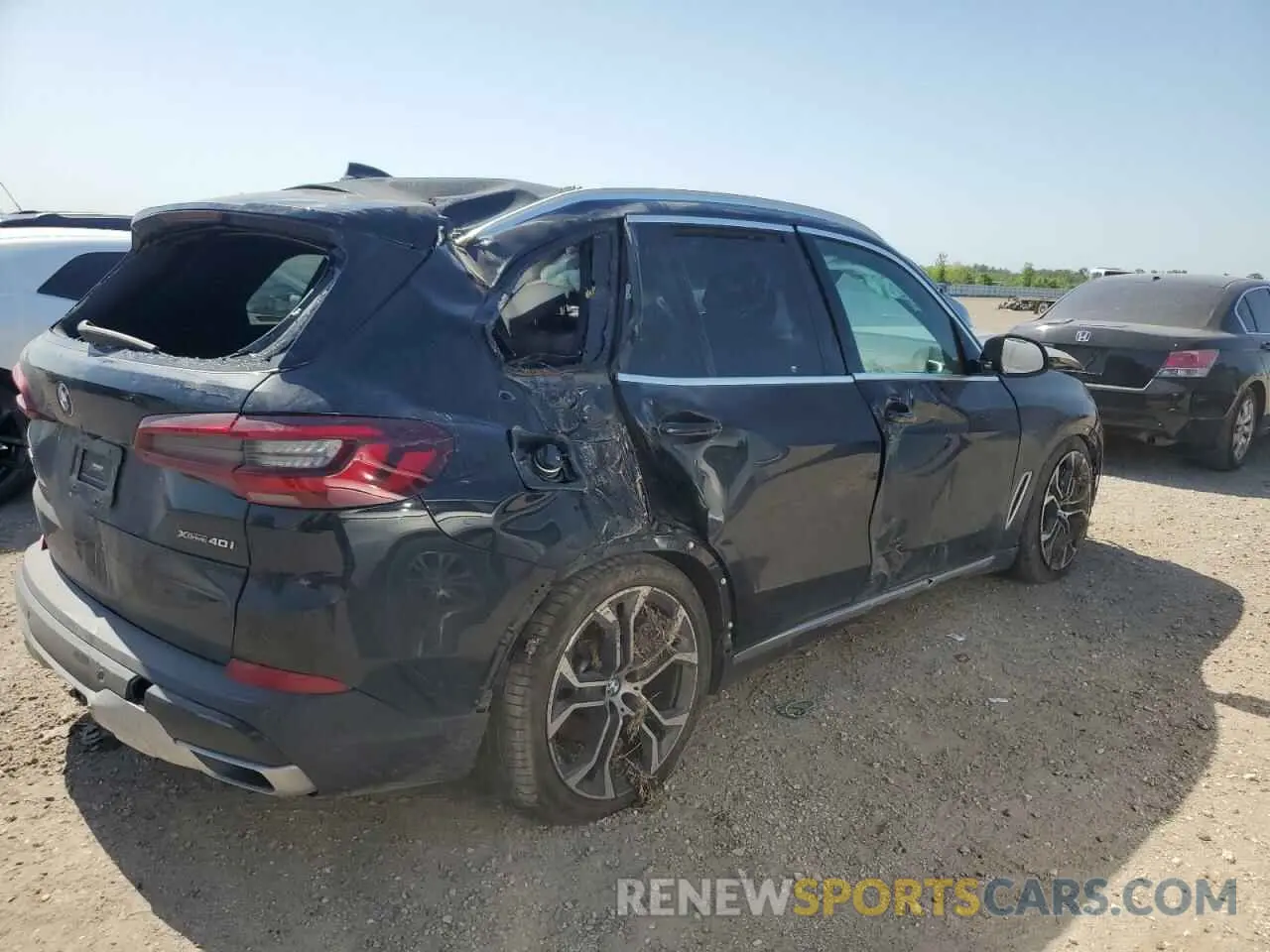 3 fotografías del automóvil dañado 5UXCR6C01N9K79249 BMW X5 2022