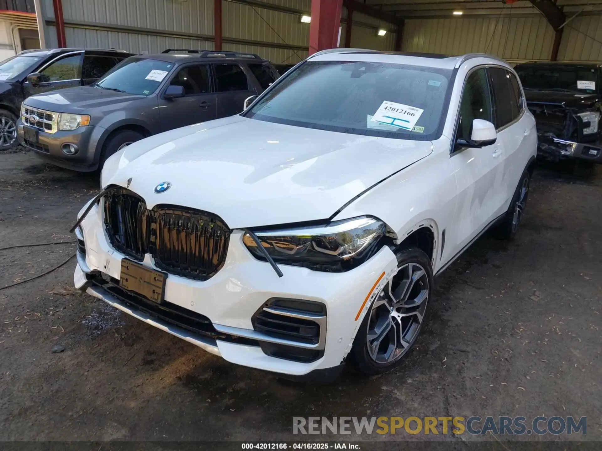 2 fotografías del automóvil dañado 5UXCR6C03N9L92409 BMW X5 2022