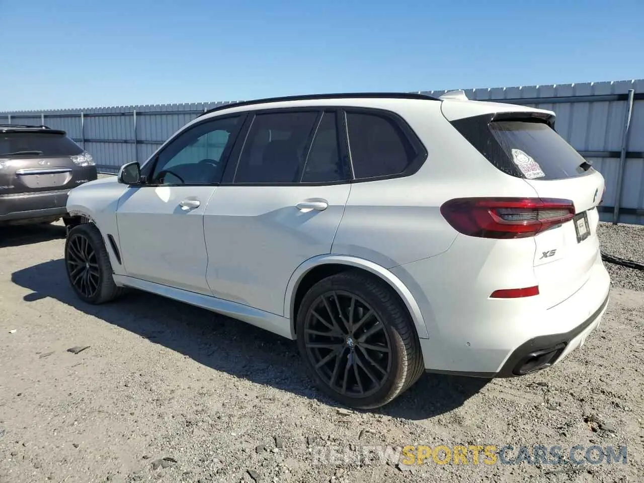 2 fotografías del automóvil dañado 5UXCR6C06N9L11340 BMW X5 2022