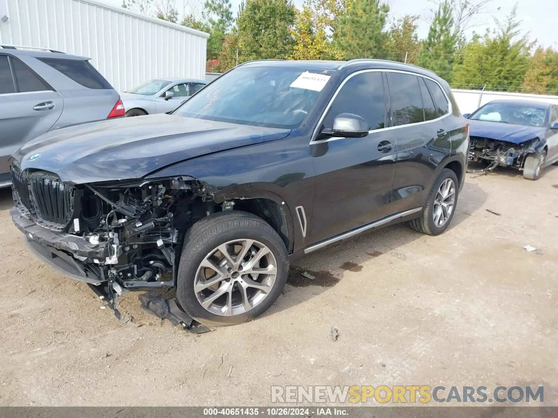 2 fotografías del automóvil dañado 5UXCR4C01P9R67176 BMW X5 2023