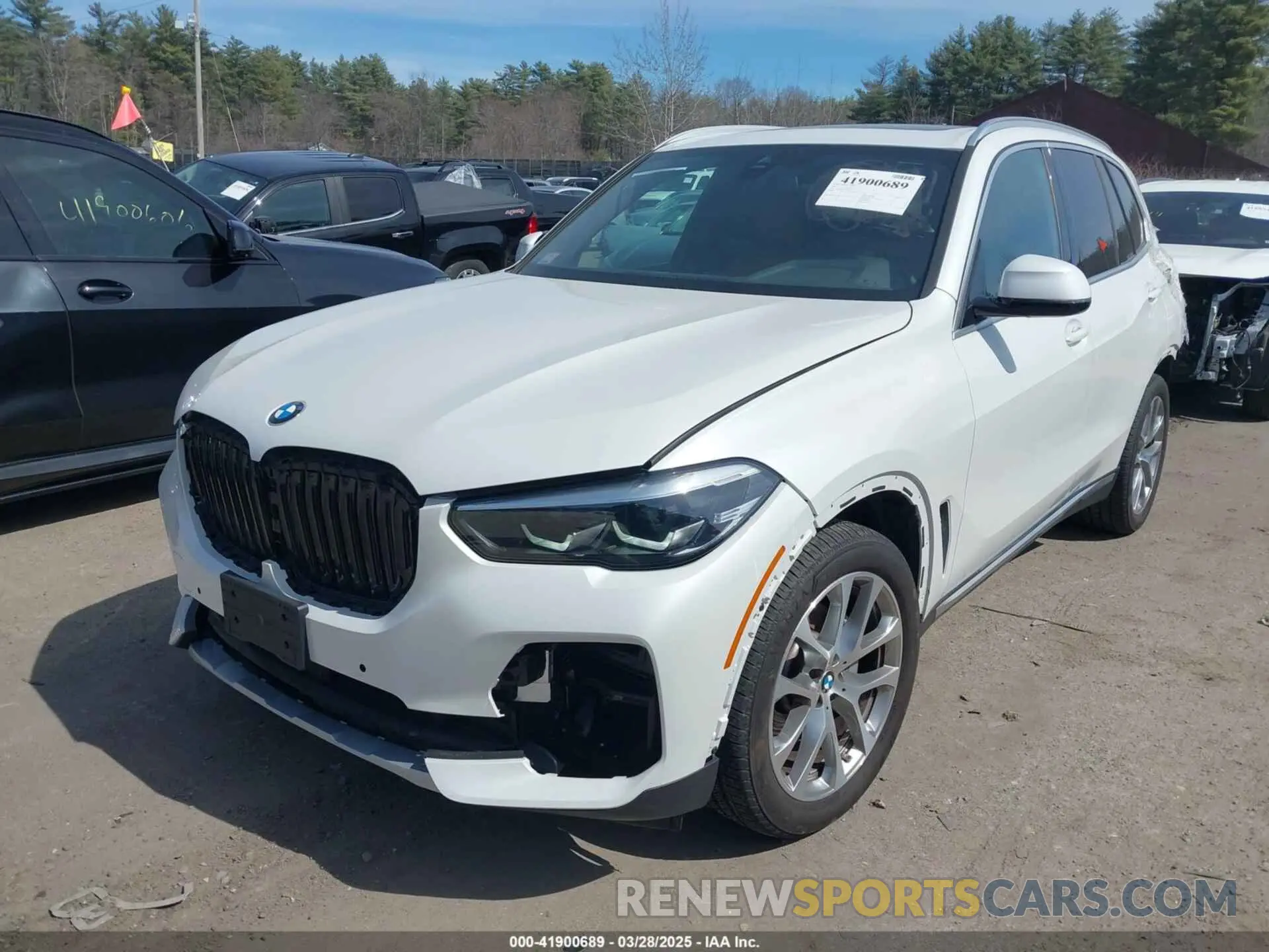 2 fotografías del automóvil dañado 5UXCR6C01P9P16931 BMW X5 2023