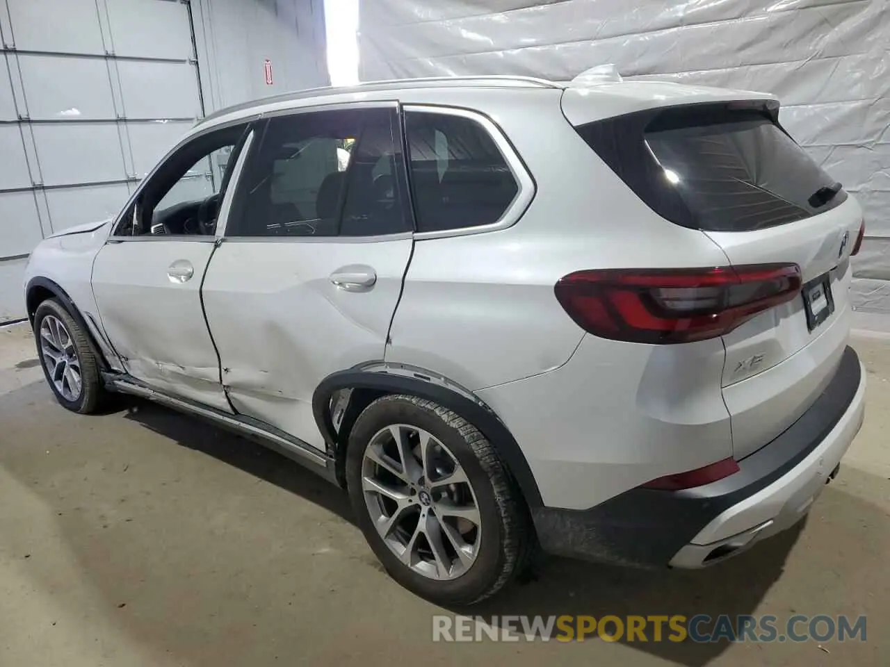 2 fotografías del automóvil dañado 5UXCR6C03P9R79115 BMW X5 2023
