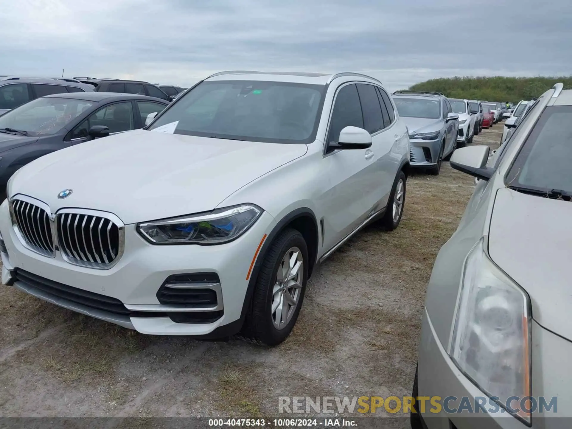 2 fotografías del automóvil dañado 5UXCR6C05P9P63105 BMW X5 2023