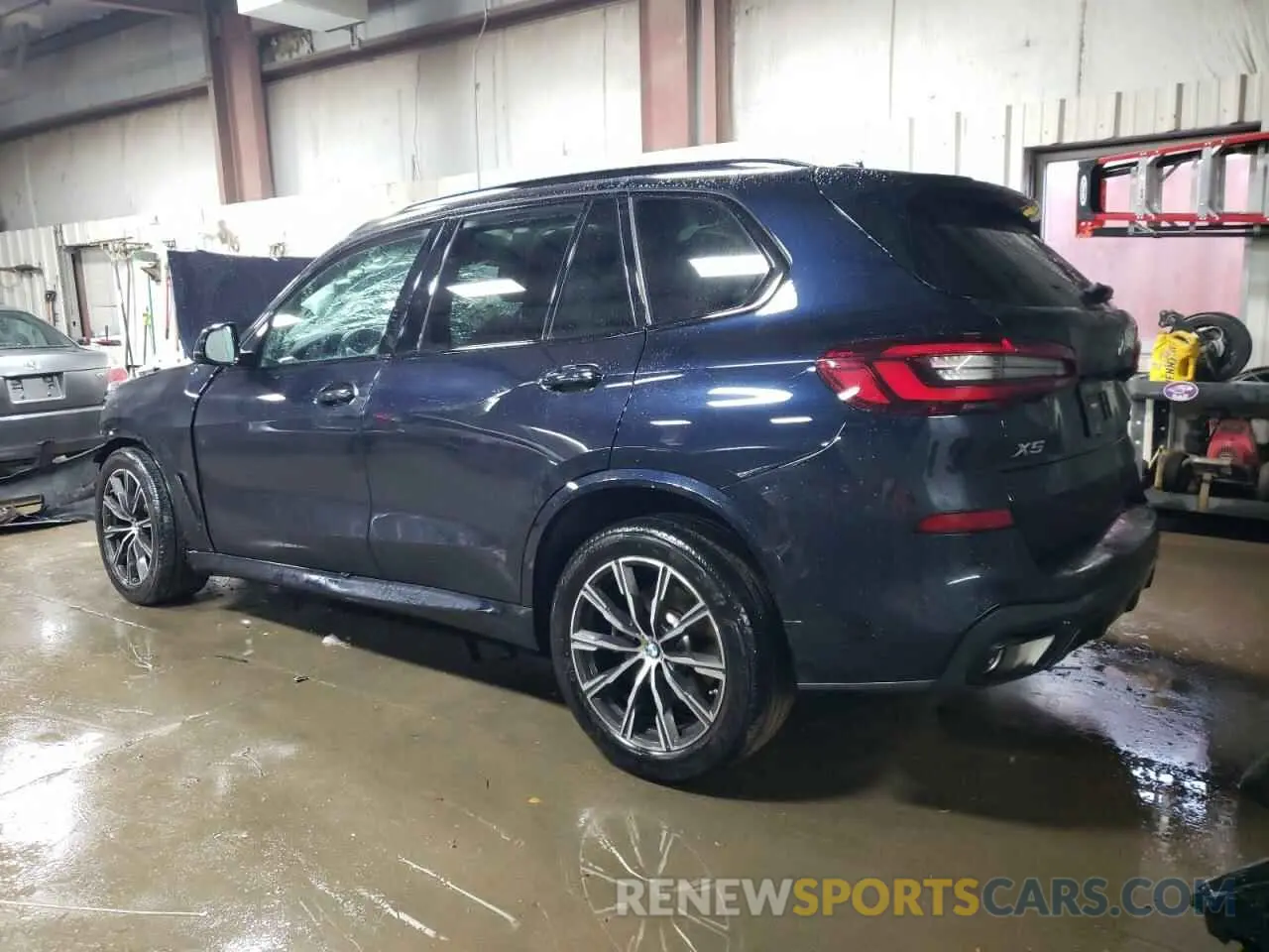 2 fotografías del automóvil dañado 5UXCR6C08P9P60909 BMW X5 2023