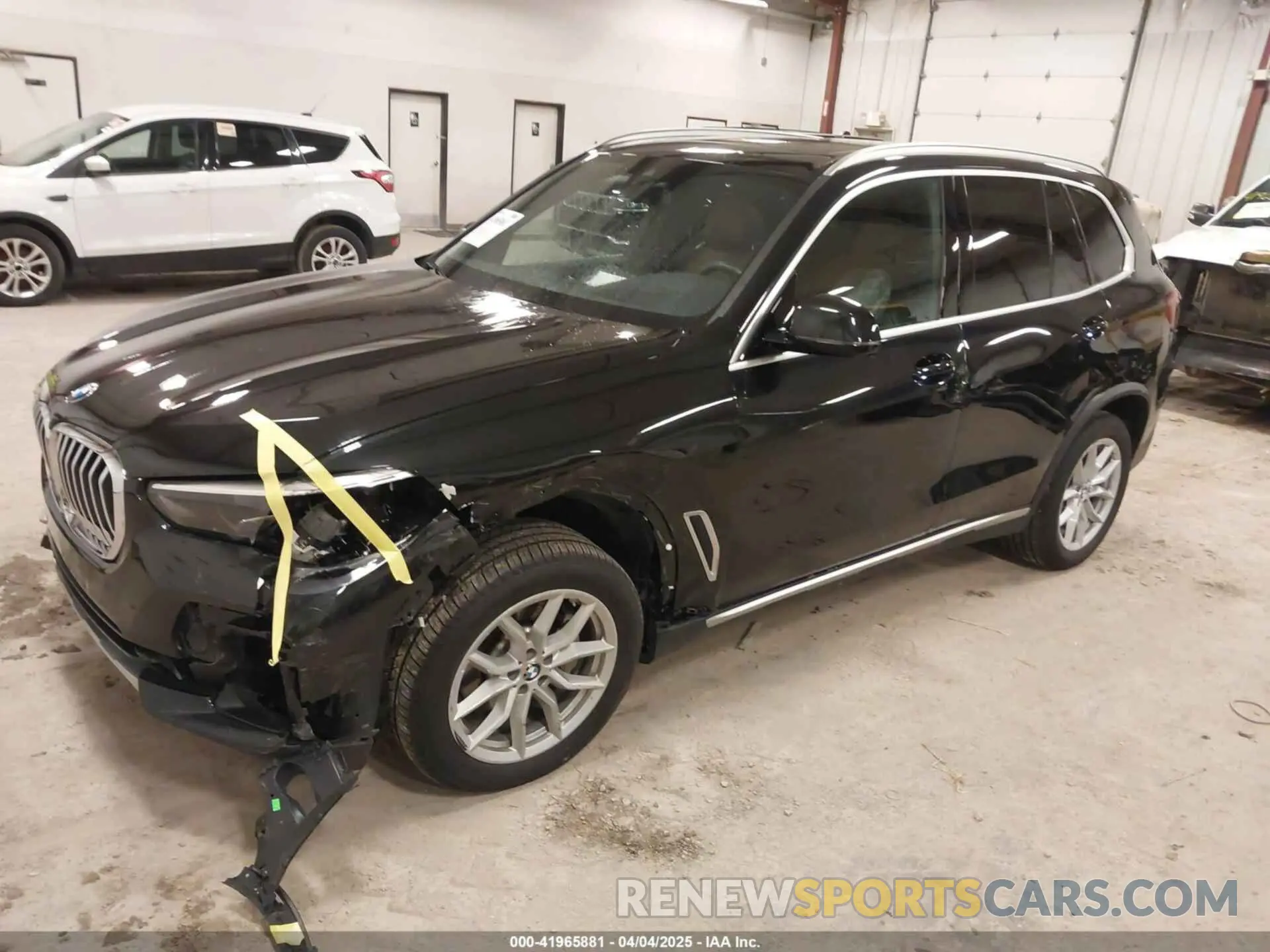 2 fotografías del automóvil dañado 5UXCR6C08P9R88991 BMW X5 2023