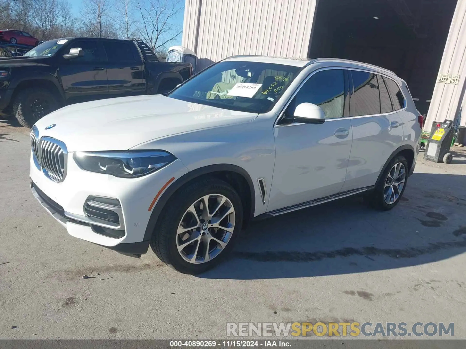2 fotografías del automóvil dañado 5UXCR6C0XP9P66680 BMW X5 2023