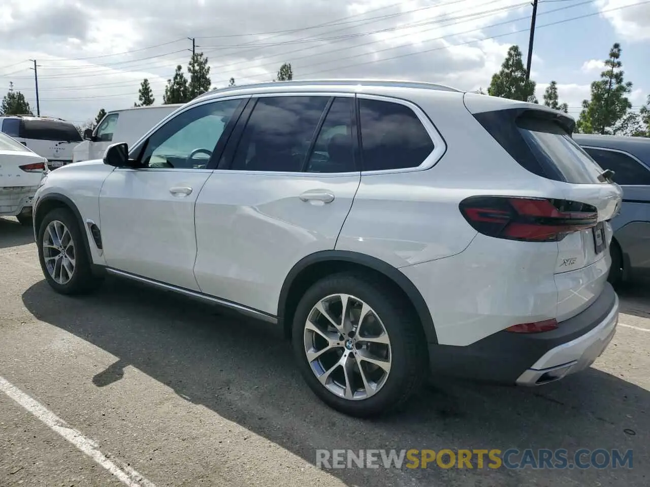 2 fotografías del automóvil dañado 5UX13EU03R9T56646 BMW X5 2024