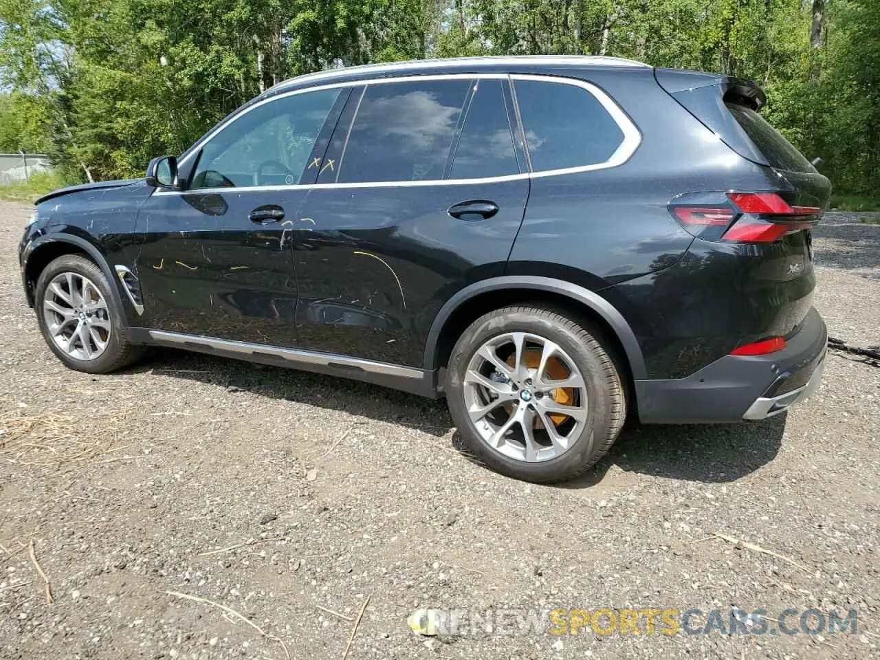 2 fotografías del automóvil dañado 5UX23EU05R9T29484 BMW X5 2024