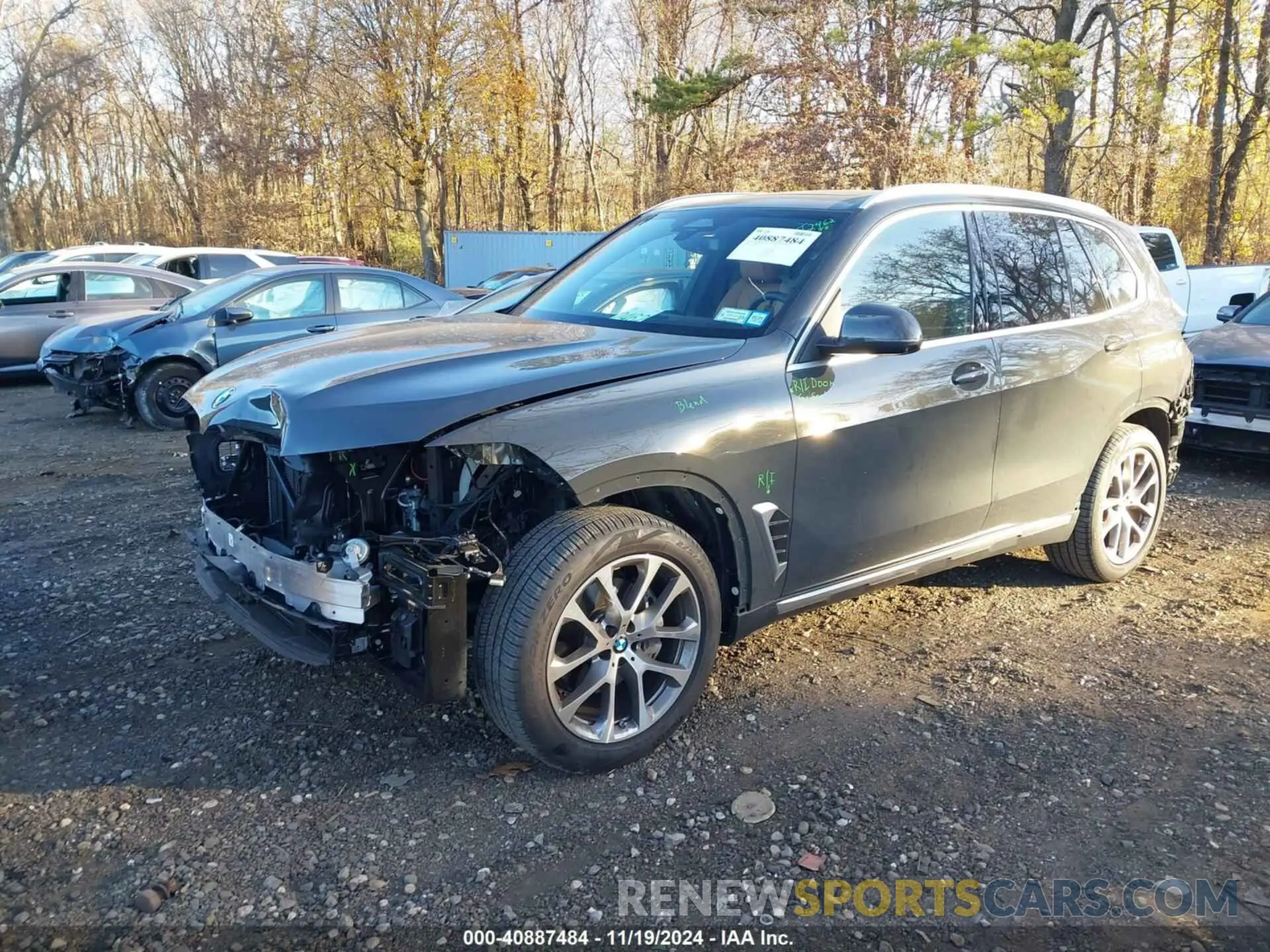 2 fotografías del automóvil dañado 5UX23EU05R9V31158 BMW X5 2024