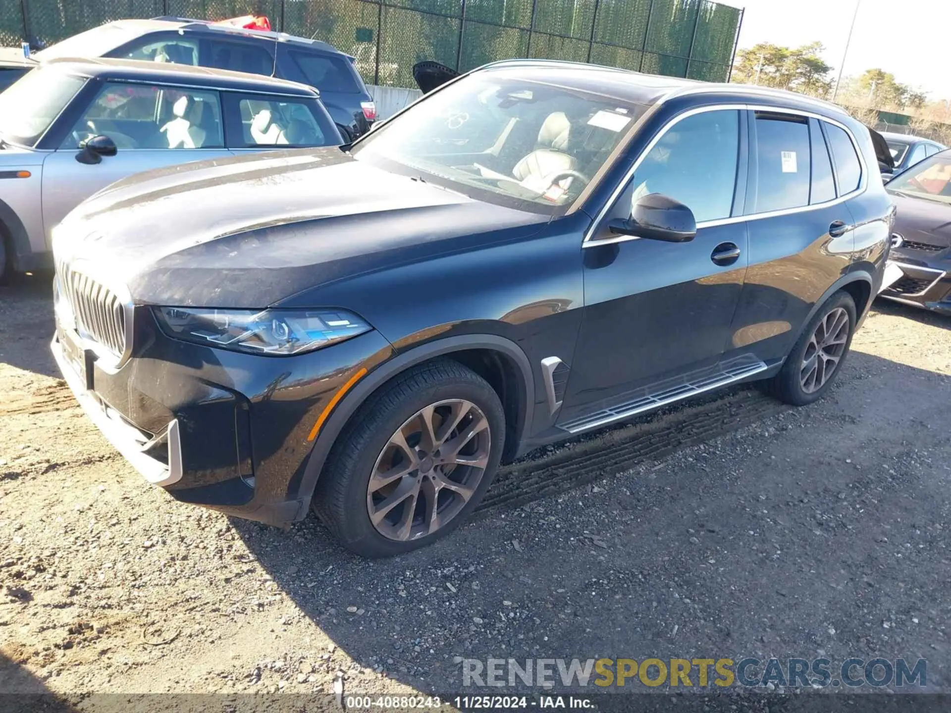 2 fotografías del automóvil dañado 5UX23EU08R9U70419 BMW X5 2024