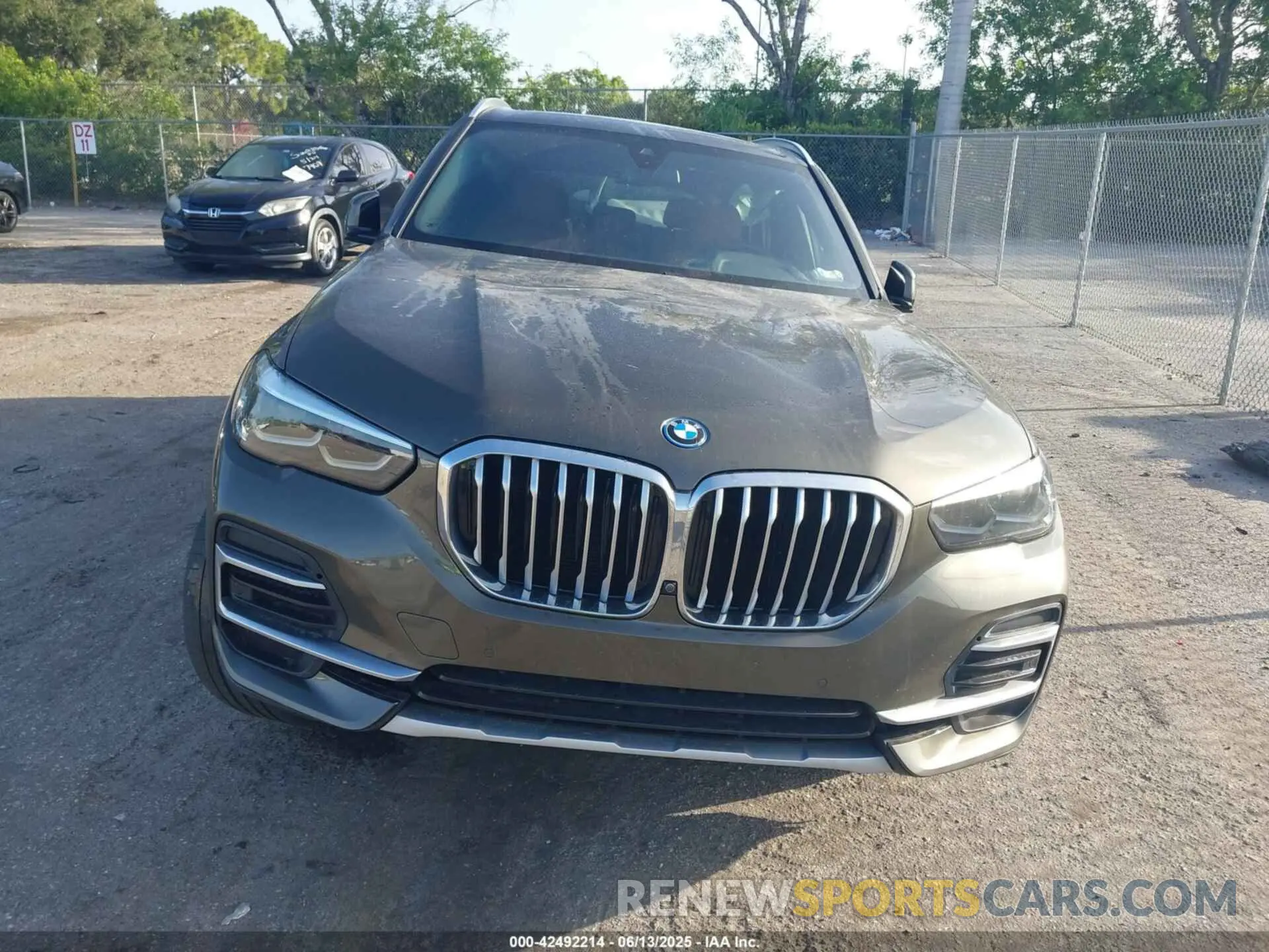 12 fotografías del automóvil dañado 5UXTA6C01N9M51979 BMW X5 PHEV 2022