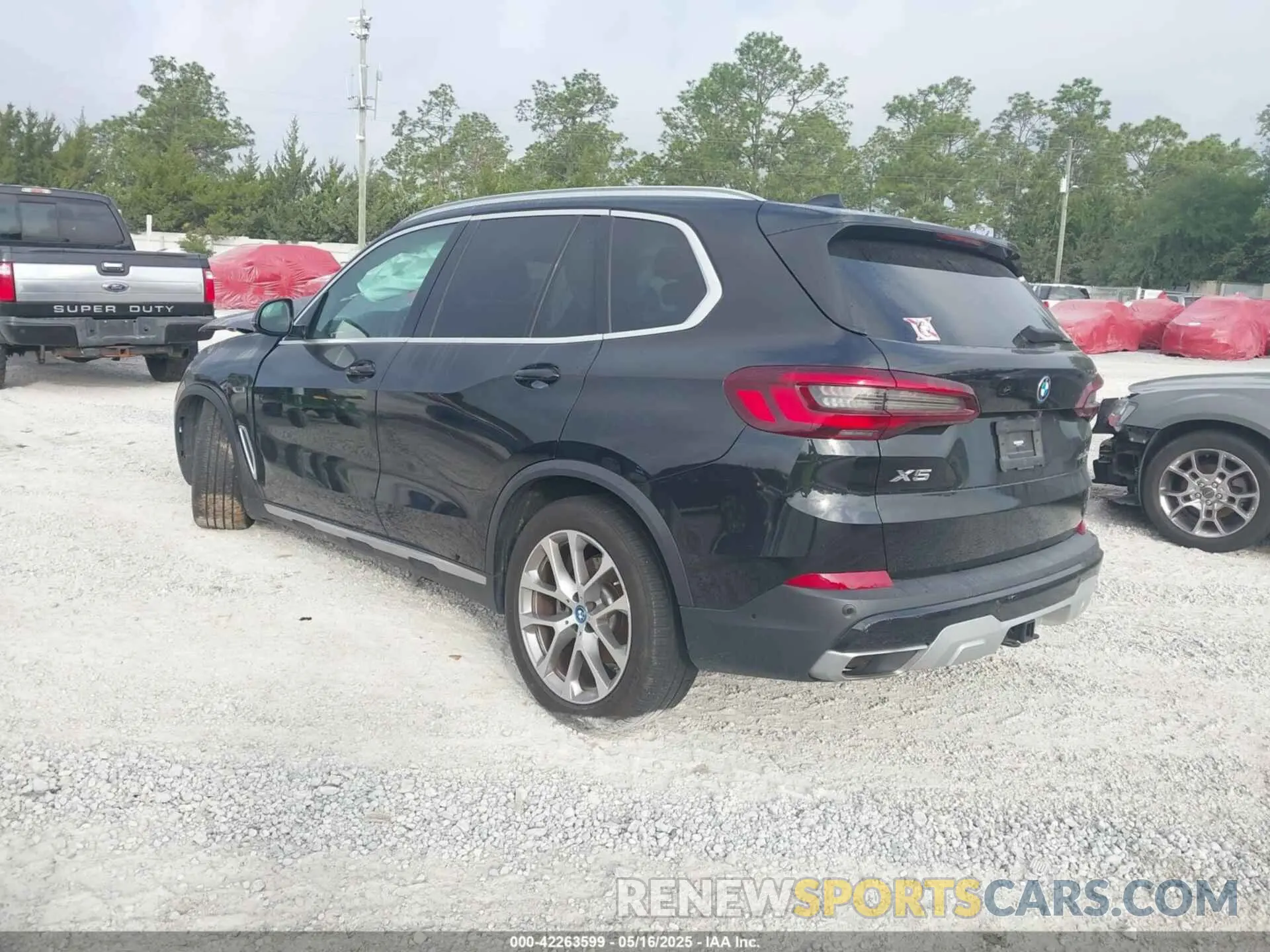 3 fotografías del automóvil dañado 5UXTA6C05N9M17771 BMW X5 PHEV 2022