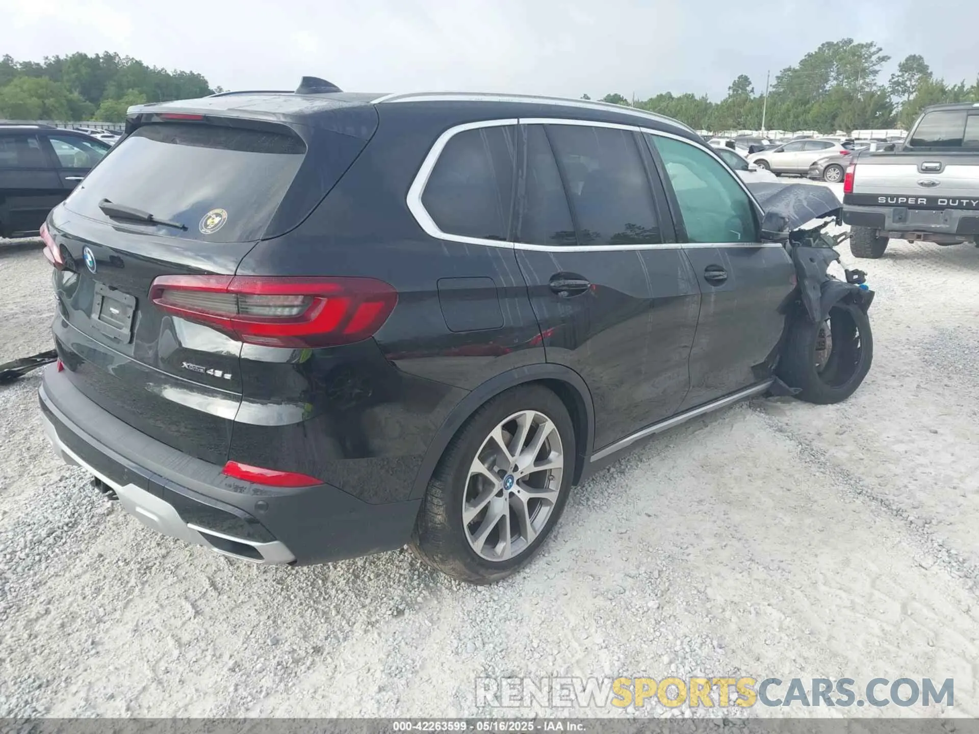 4 fotografías del automóvil dañado 5UXTA6C05N9M17771 BMW X5 PHEV 2022