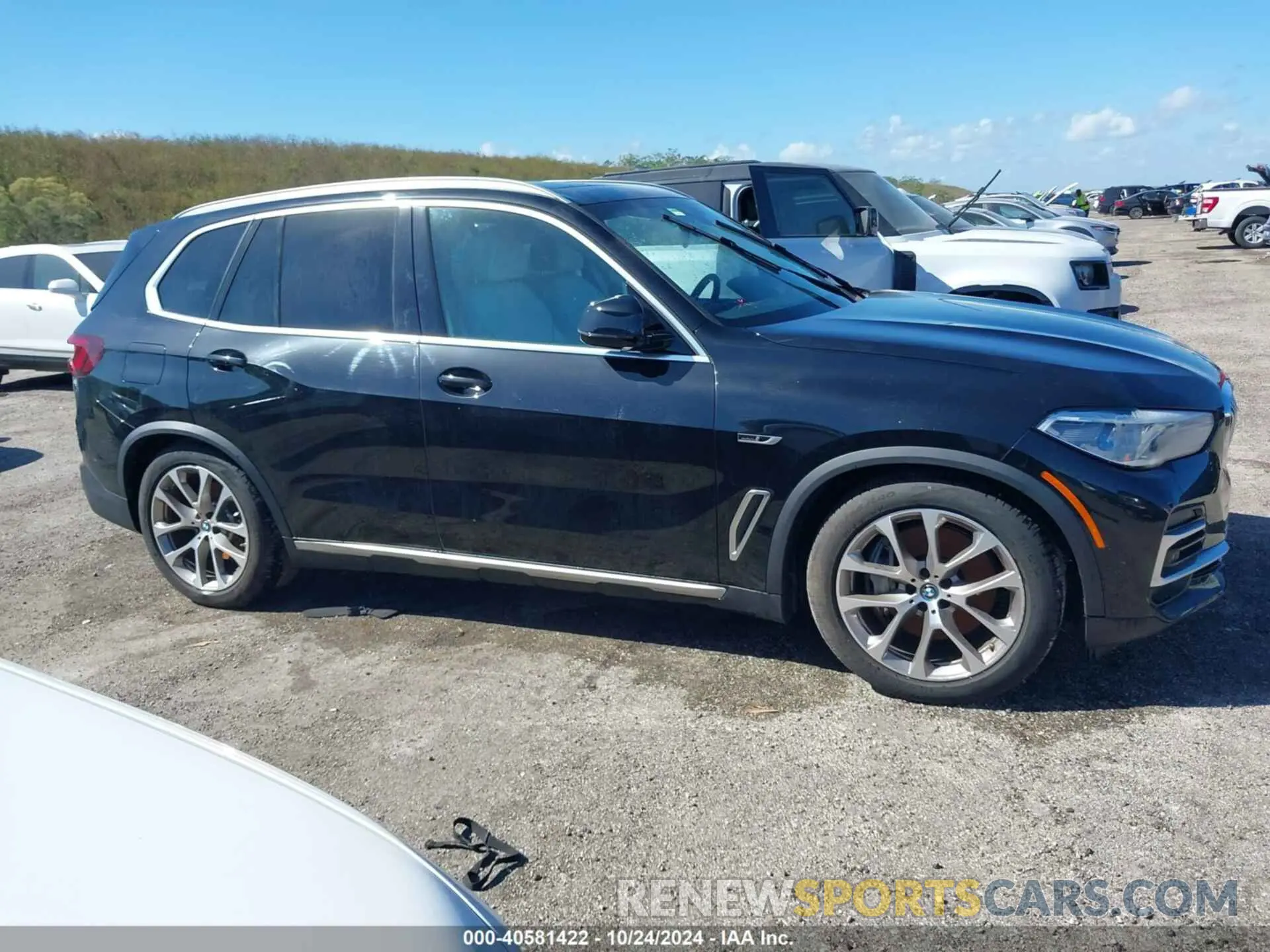 12 fotografías del automóvil dañado 5UXTA6C03P9P30322 BMW X5 PHEV 2023