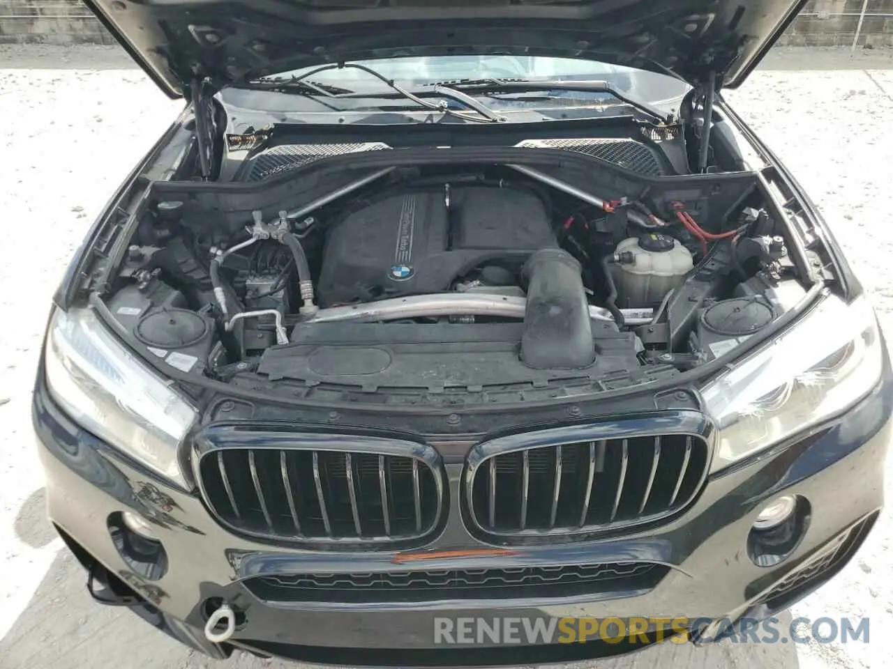12 fotografías del automóvil dañado 5UXKU0C5XK0G92972 BMW X6 2019