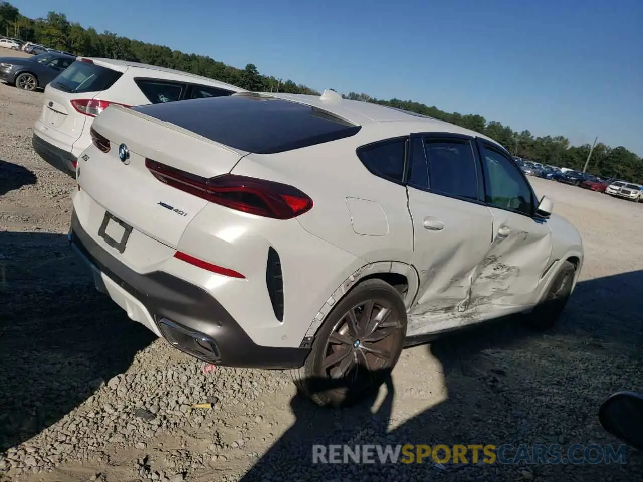 3 fotografías del automóvil dañado 5UXCY6C07N9K75399 BMW X6 2022