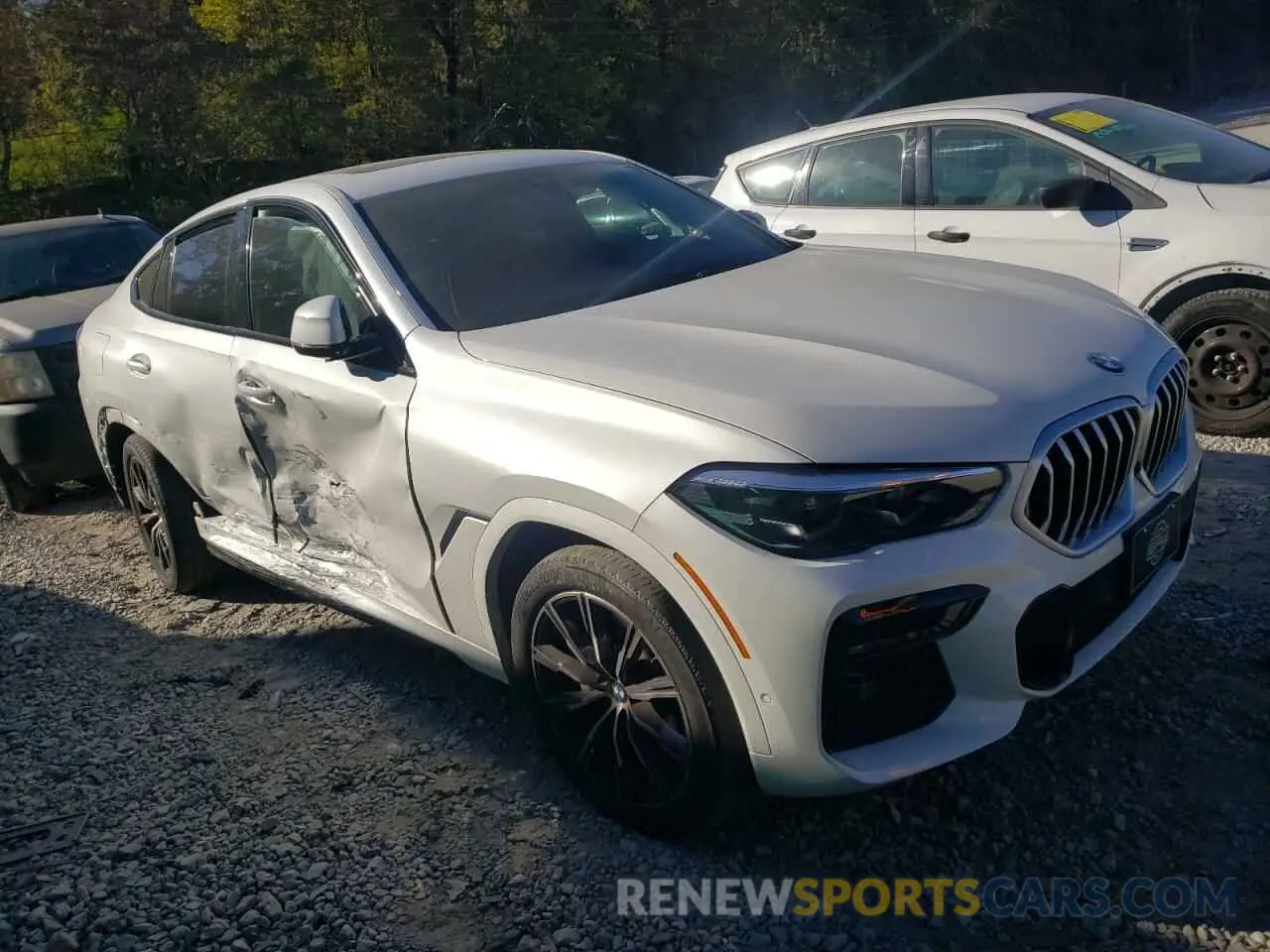 4 fotografías del automóvil dañado 5UXCY6C07N9K75399 BMW X6 2022