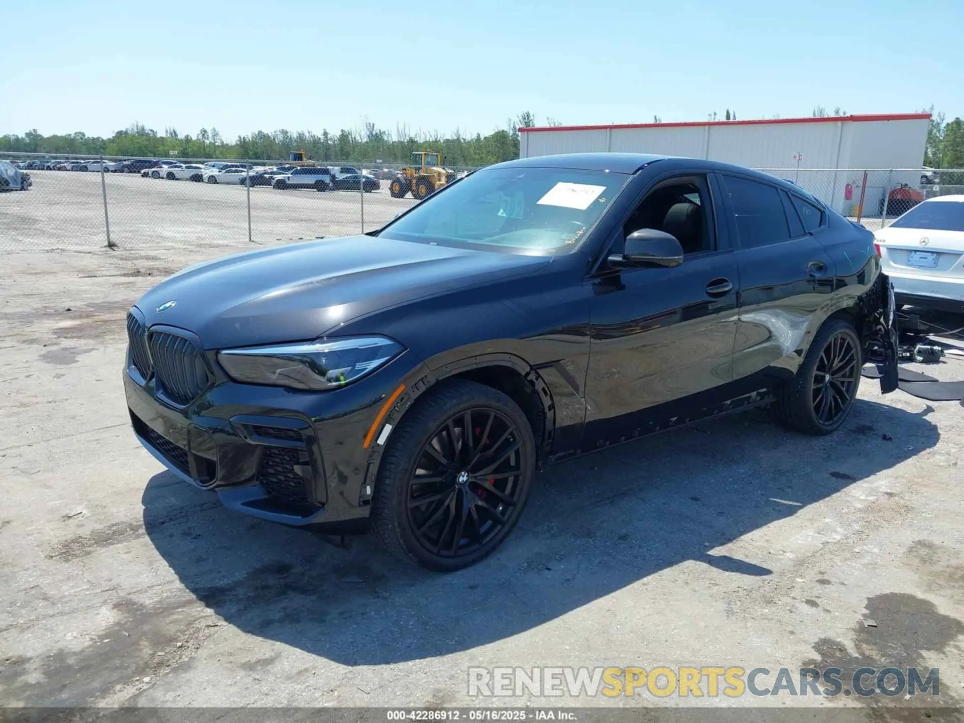 2 fotografías del automóvil dañado 5UXCY6C09N9L97438 BMW X6 2022