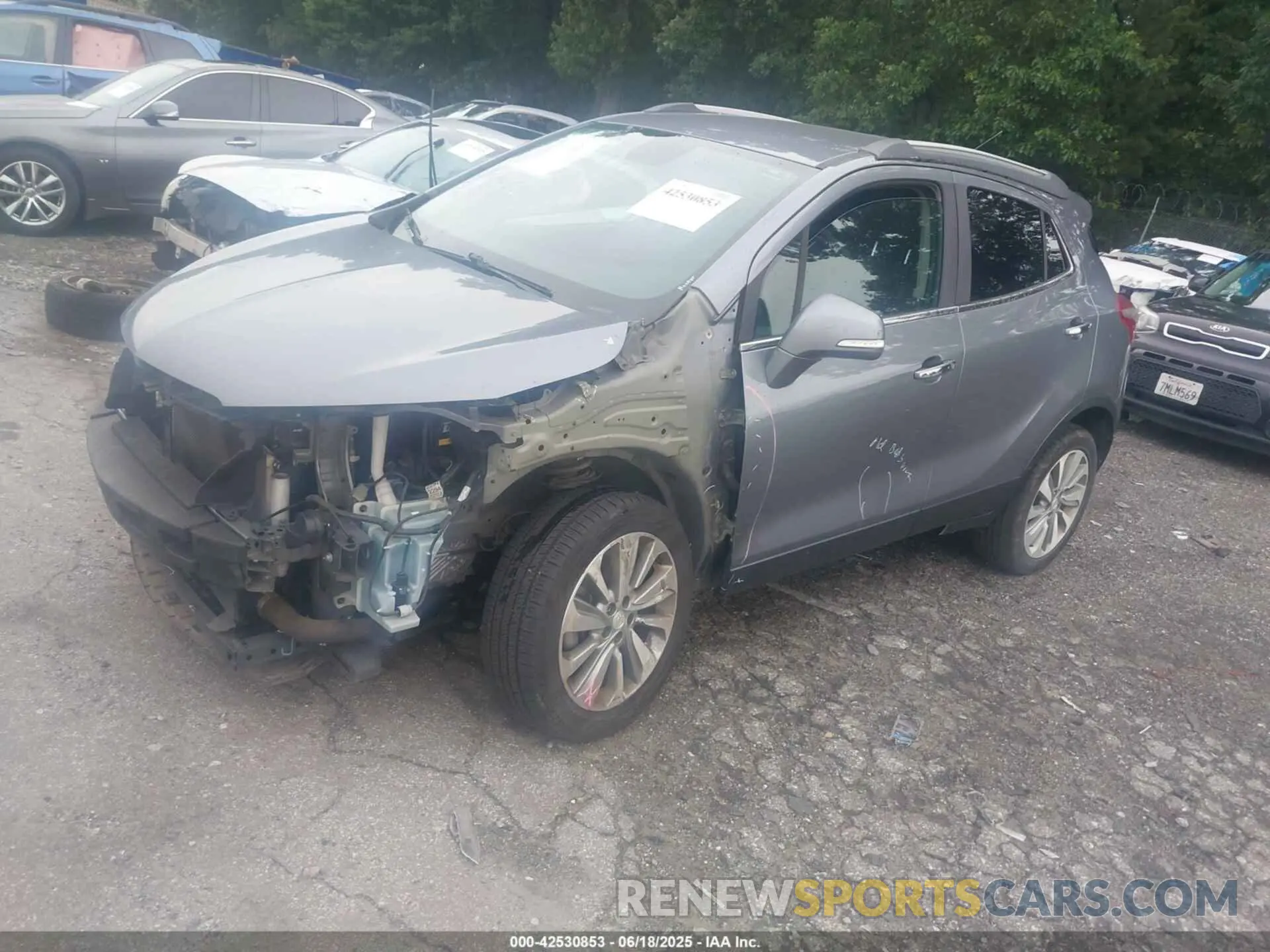 2 fotografías del automóvil dañado KL4CJASB9KB779169 BUICK ENCORE 2019