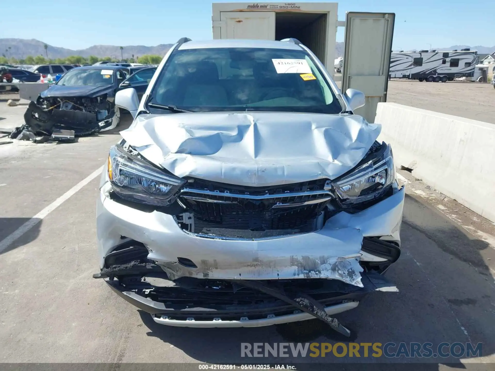 12 fotografías del automóvil dañado KL4CJASB3MB311182 BUICK ENCORE 2021