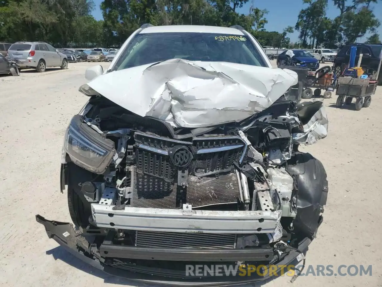 5 fotografías del automóvil dañado KL4CJASM3NB553523 BUICK ENCORE 2022