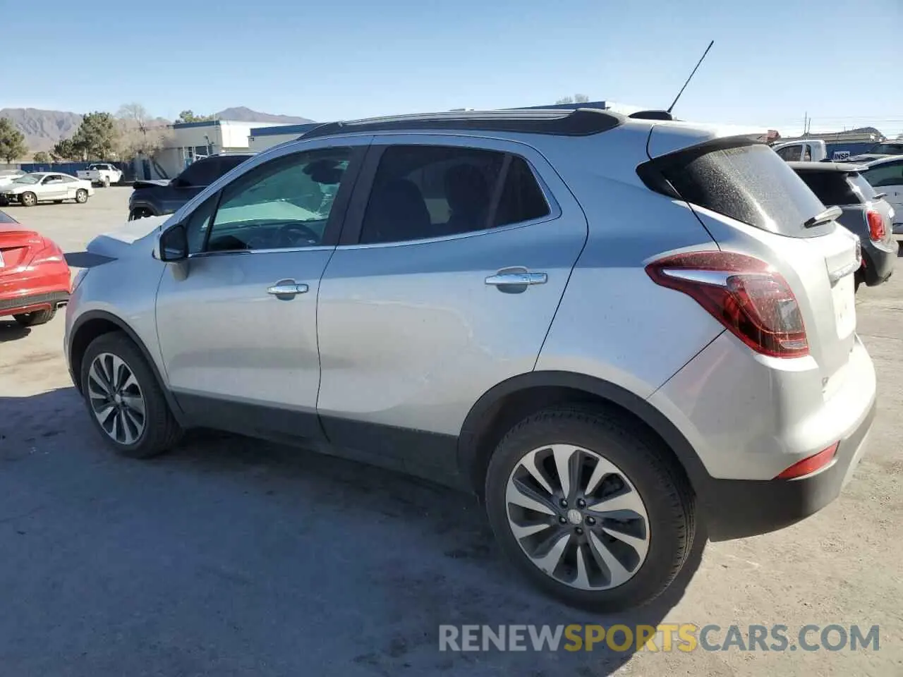 2 fotografías del automóvil dañado KL4CJESM1NB560025 BUICK ENCORE 2022