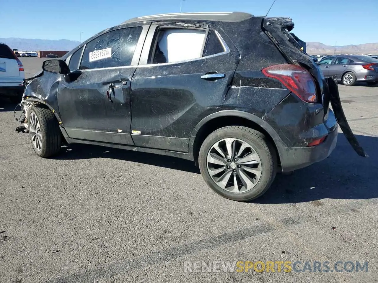 2 fotografías del automóvil dañado KL4CJESM2NB552483 BUICK ENCORE 2022