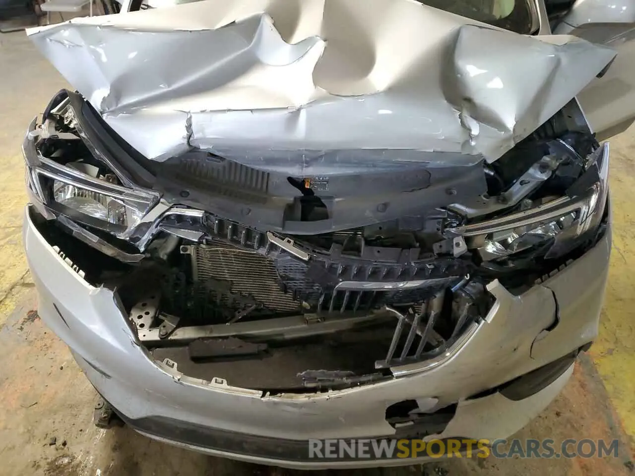 12 fotografías del automóvil dañado KL4CJESM6NB554804 BUICK ENCORE 2022