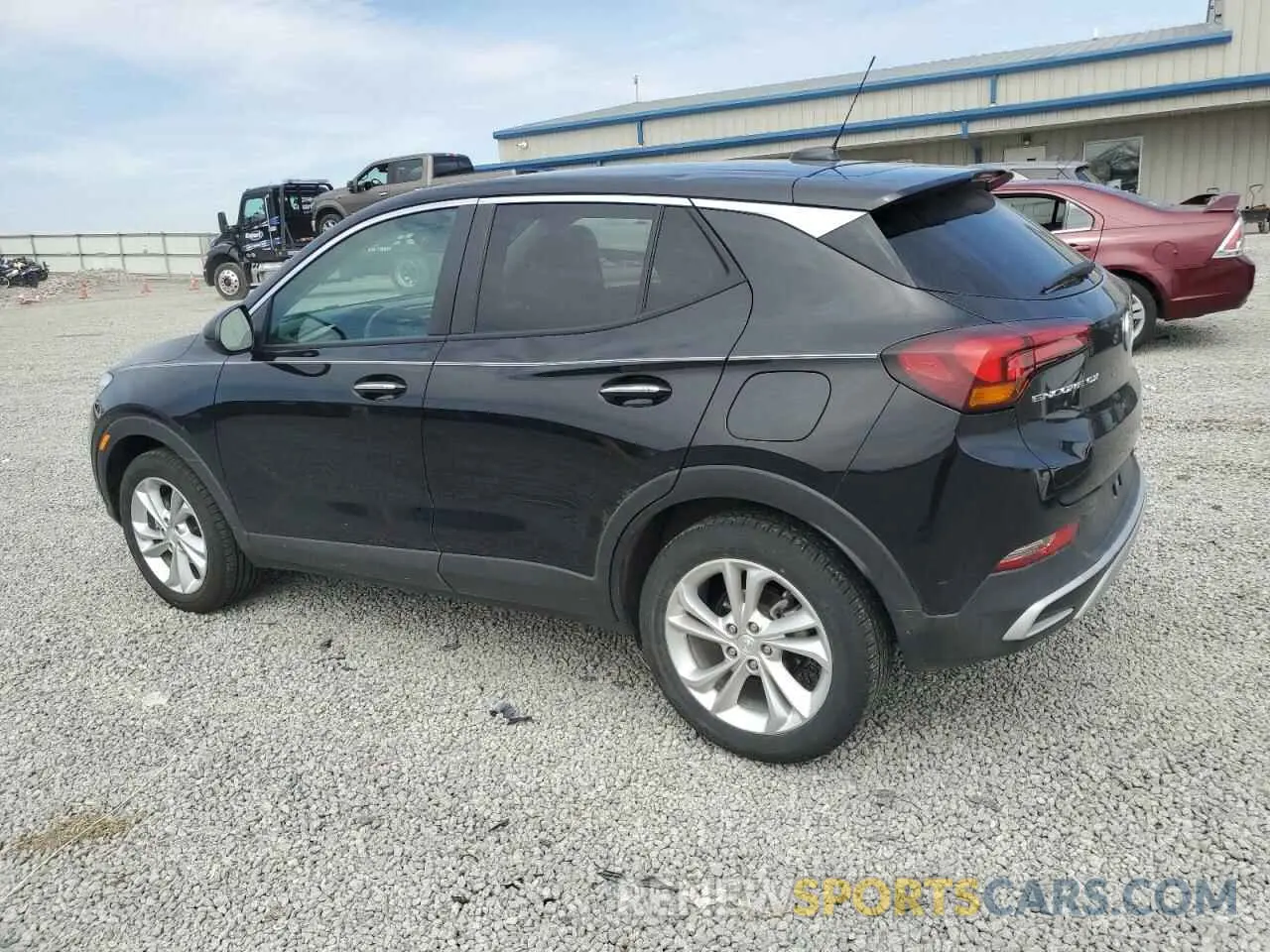 2 fotografías del automóvil dañado KL4MMBS23PB132551 BUICK ENCORE 2023