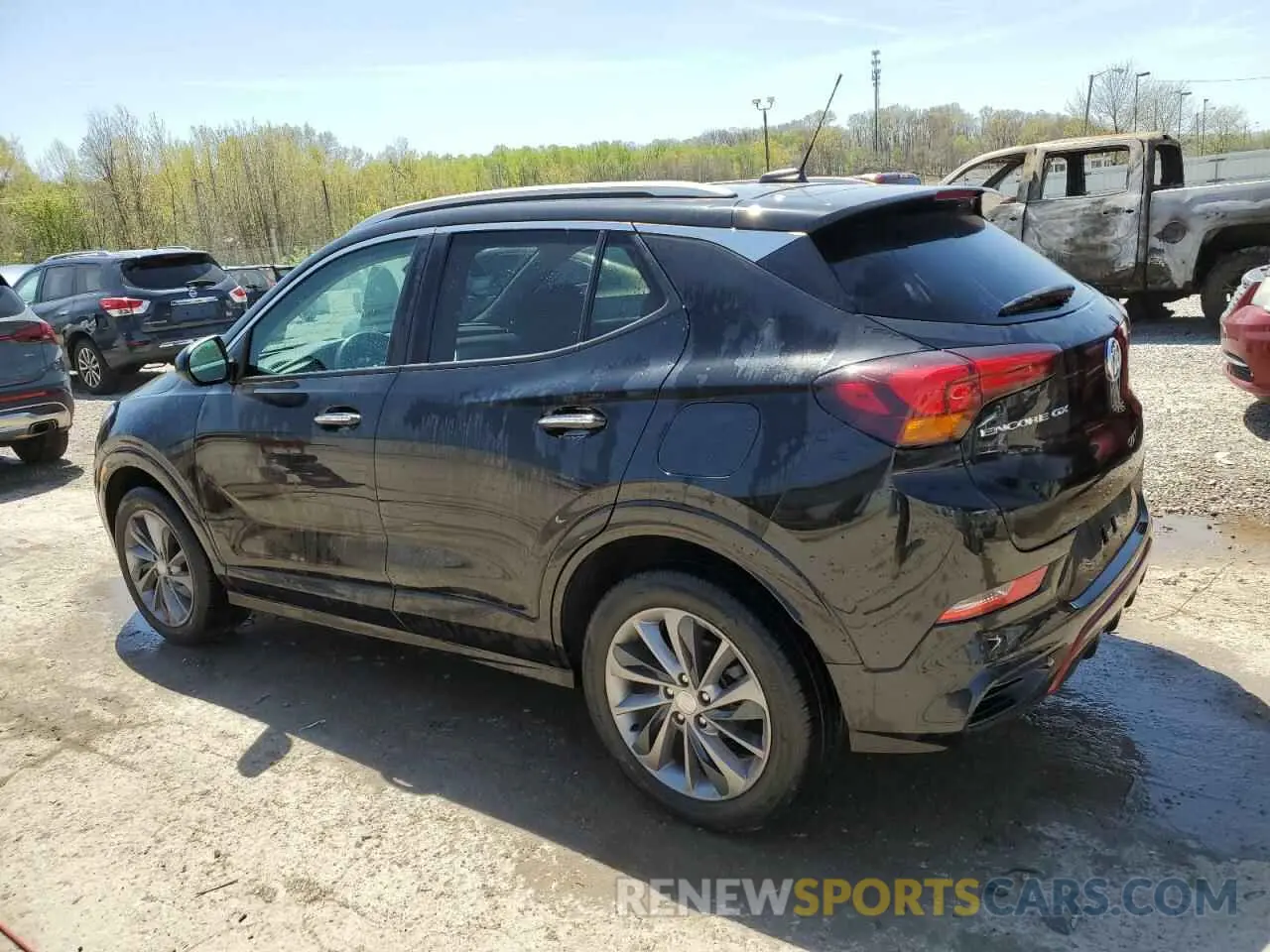2 fotografías del automóvil dañado KL4MMDSL4PB002749 BUICK ENCORE 2023