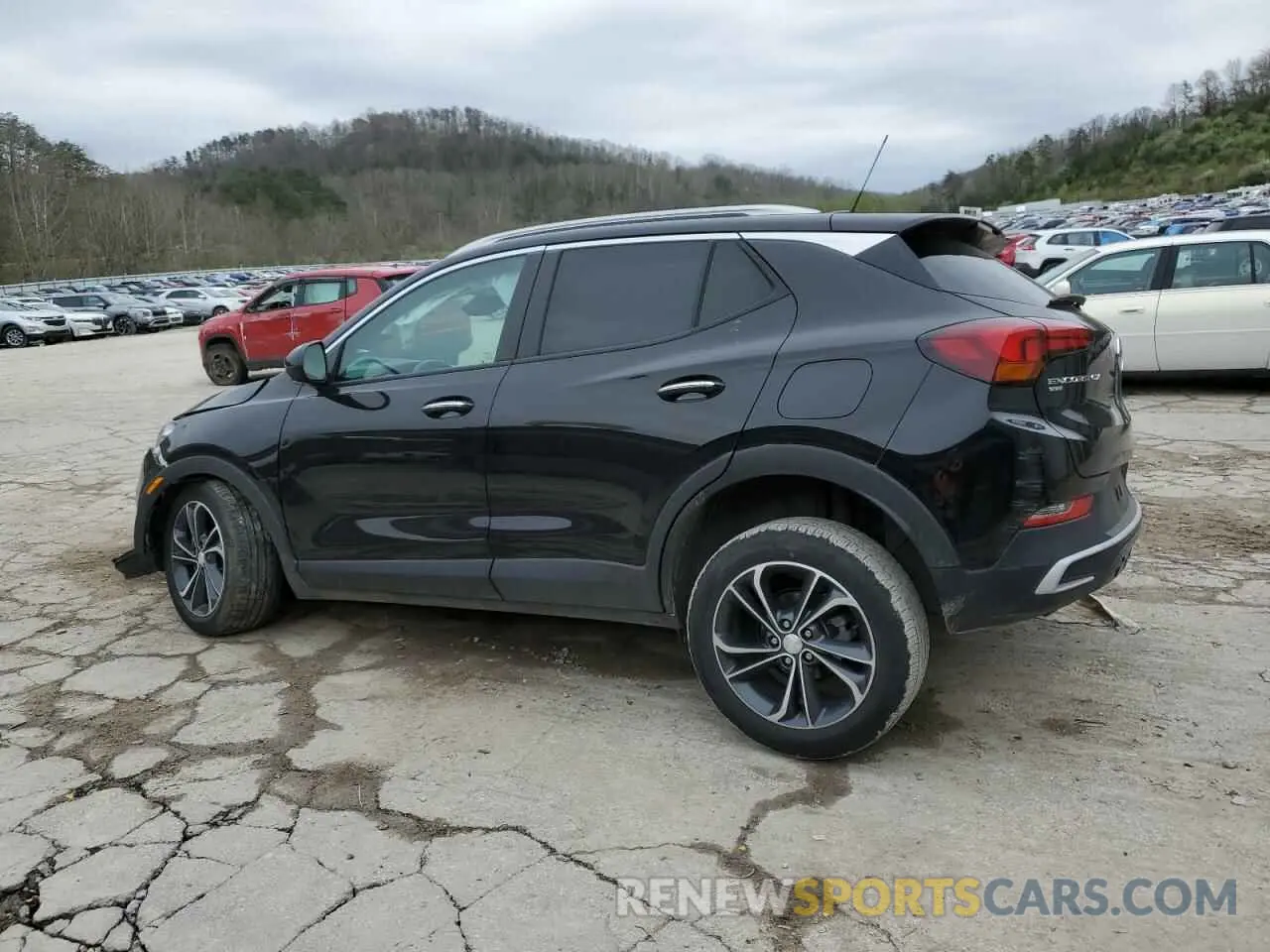 2 fotografías del automóvil dañado KL4MMESL7PB044497 BUICK ENCORE 2023