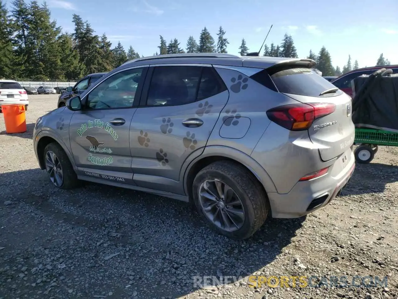 2 fotografías del automóvil dañado KL4MMESL8PB093417 BUICK ENCORE 2023