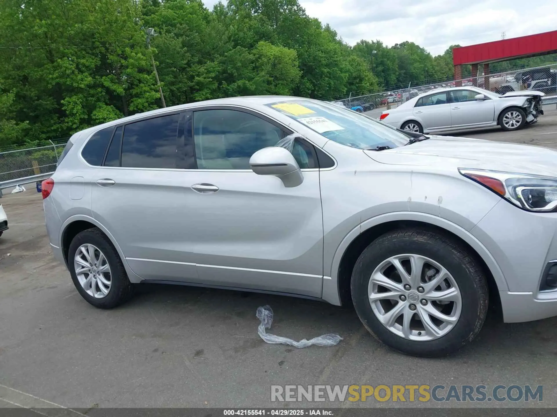 13 fotografías del automóvil dañado LRBFX1SA5KD111574 BUICK ENVISION 2019