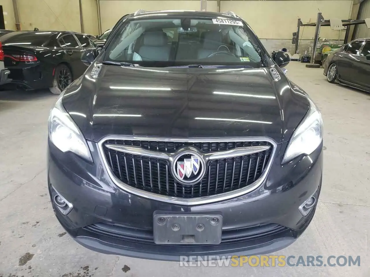 5 fotografías del automóvil dañado LRBFXCSA1KD014710 BUICK ENVISION 2019