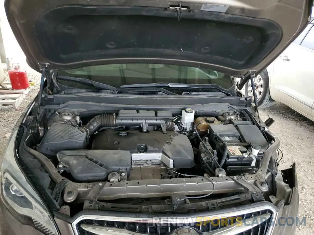 12 fotografías del automóvil dañado LRBFXCSA2KD020662 BUICK ENVISION 2019