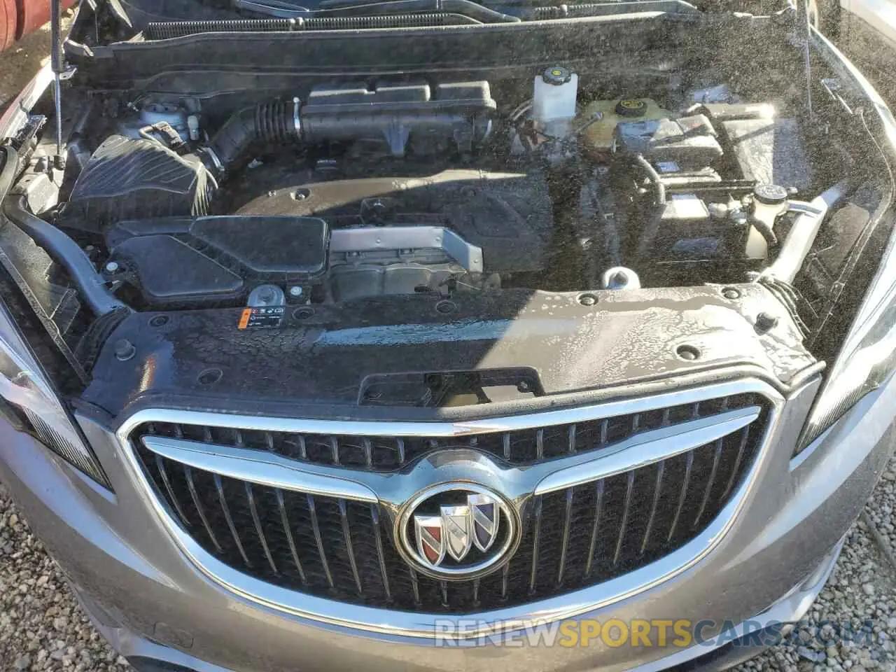 12 fotografías del automóvil dañado LRBFXCSA6KD014282 BUICK ENVISION 2019