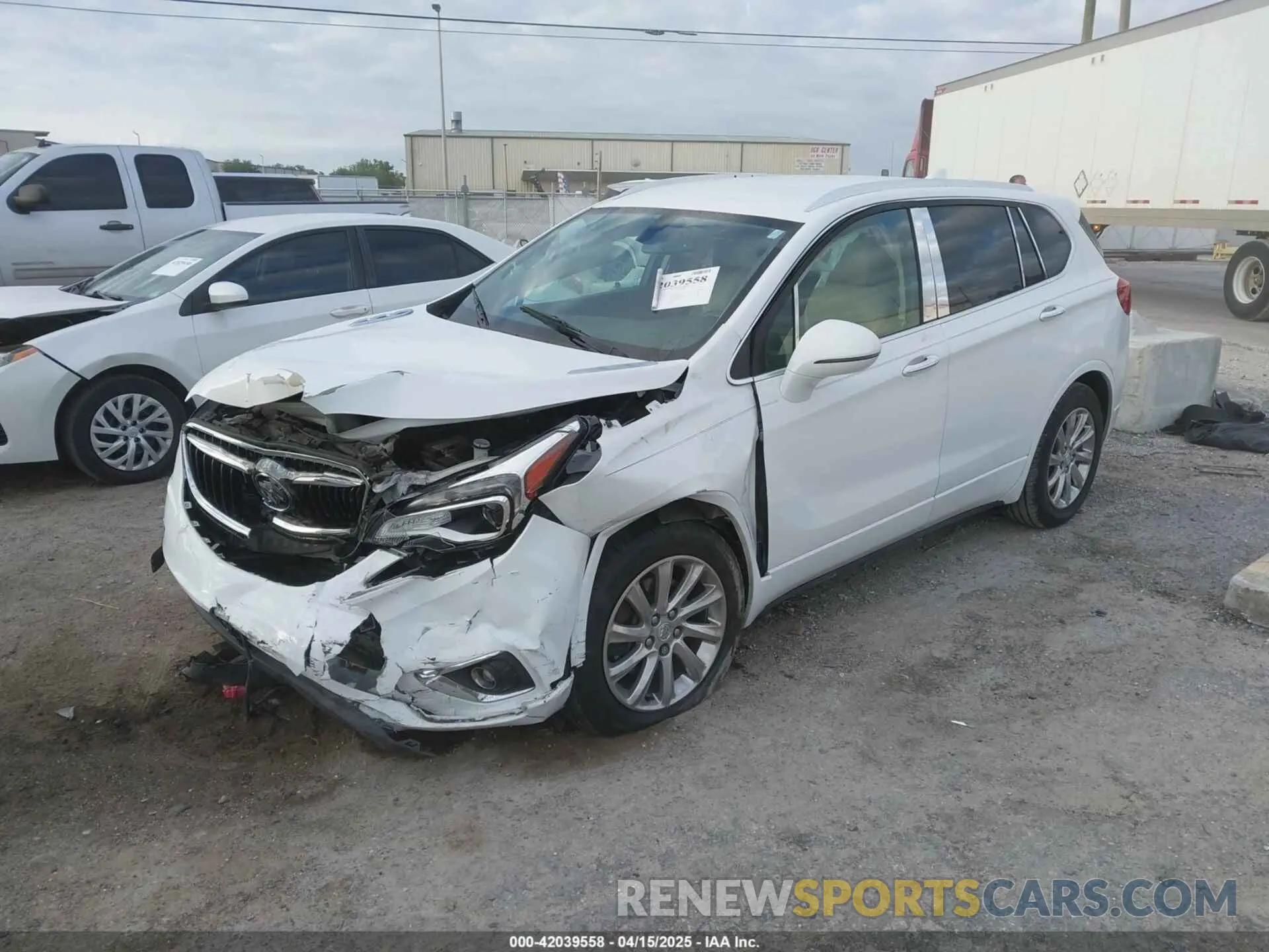2 fotografías del automóvil dañado LRBFXCSA7KD015442 BUICK ENVISION 2019