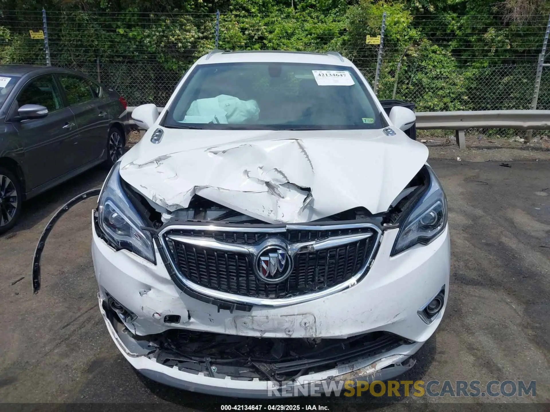 12 fotografías del automóvil dañado LRBFXCSA7KD124984 BUICK ENVISION 2019