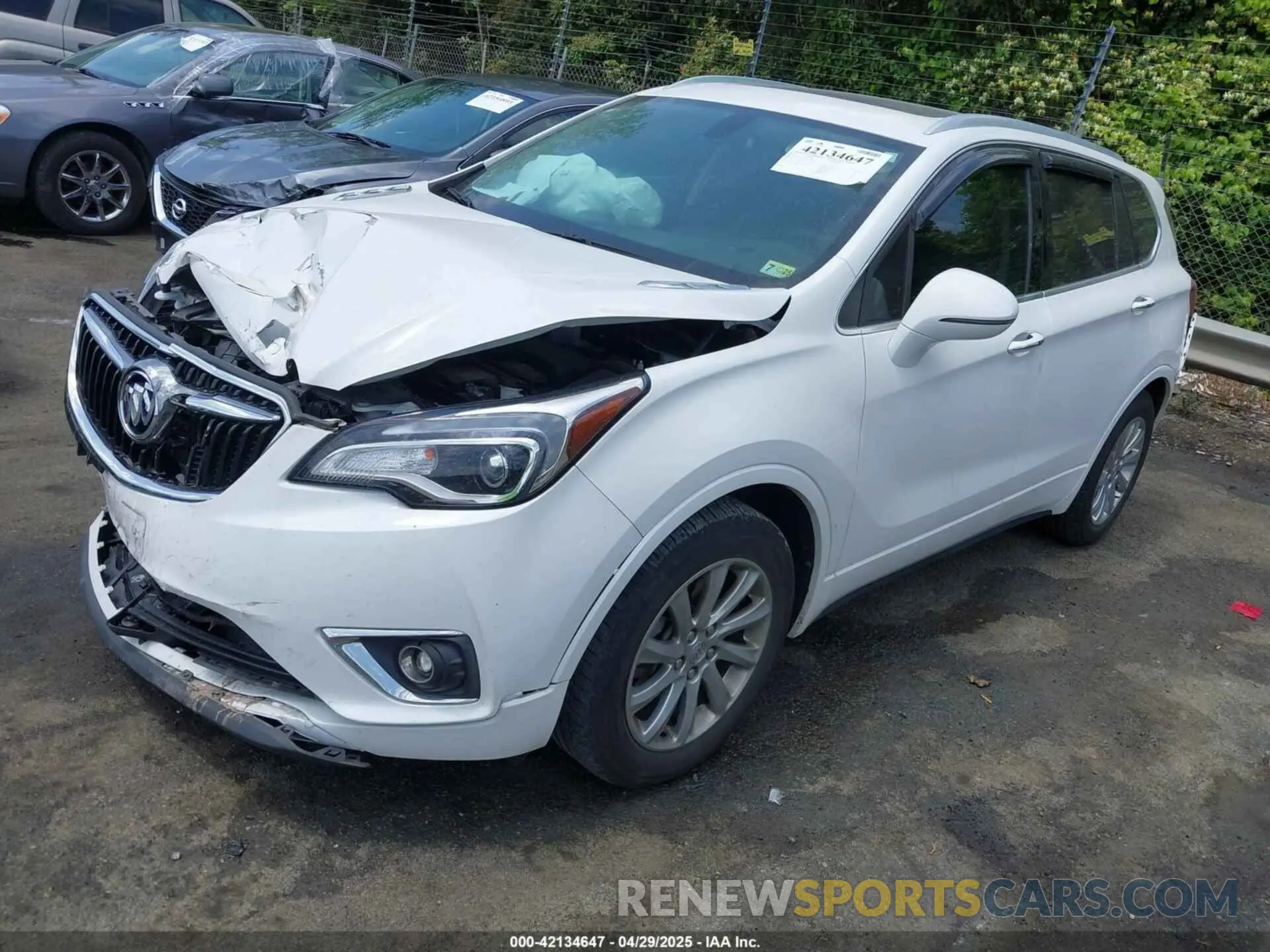 2 fotografías del automóvil dañado LRBFXCSA7KD124984 BUICK ENVISION 2019