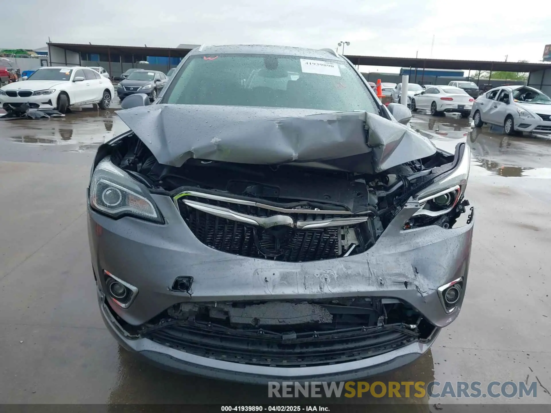 11 fotografías del automóvil dañado LRBFXCSA8KD010881 BUICK ENVISION 2019