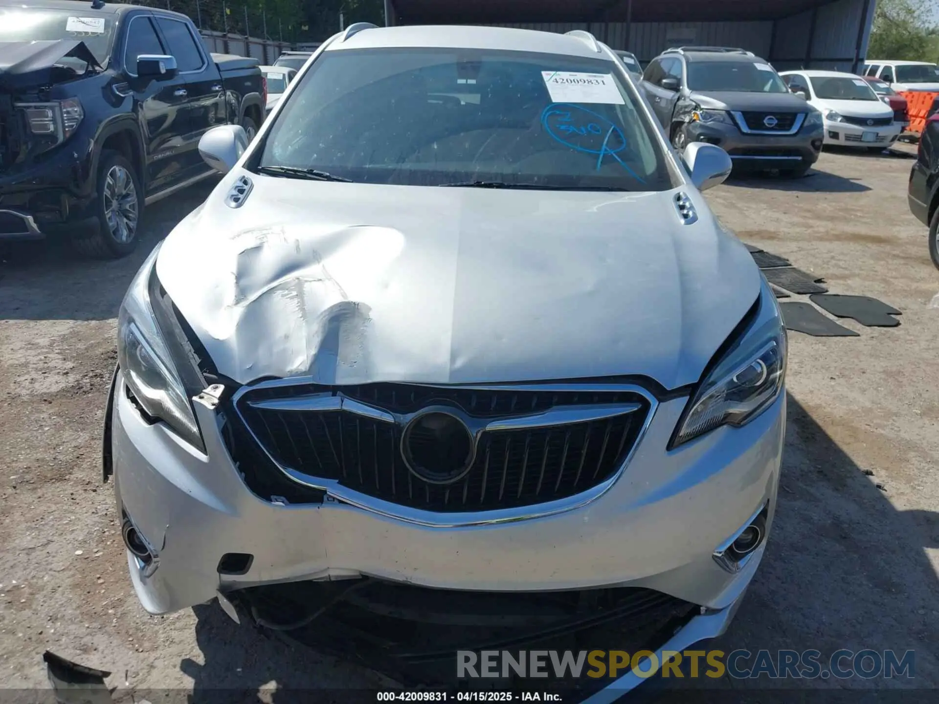 12 fotografías del automóvil dañado LRBFXCSA8KD011271 BUICK ENVISION 2019