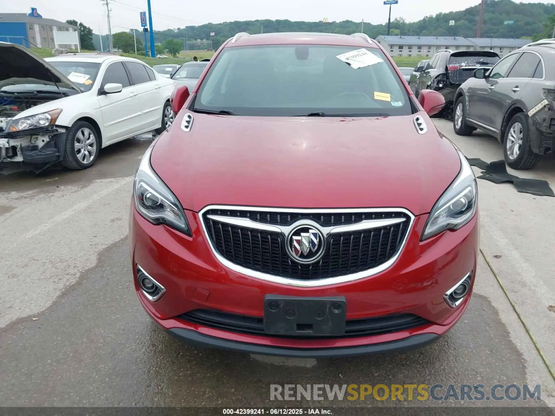 12 fotografías del automóvil dañado LRBFXCSA8KD142698 BUICK ENVISION 2019