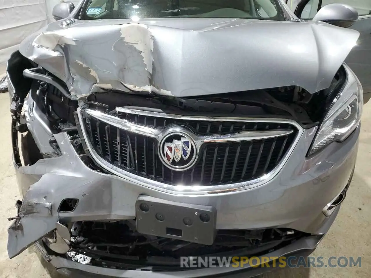 12 fotografías del automóvil dañado LRBFX2SA8LD016336 BUICK ENVISION 2020