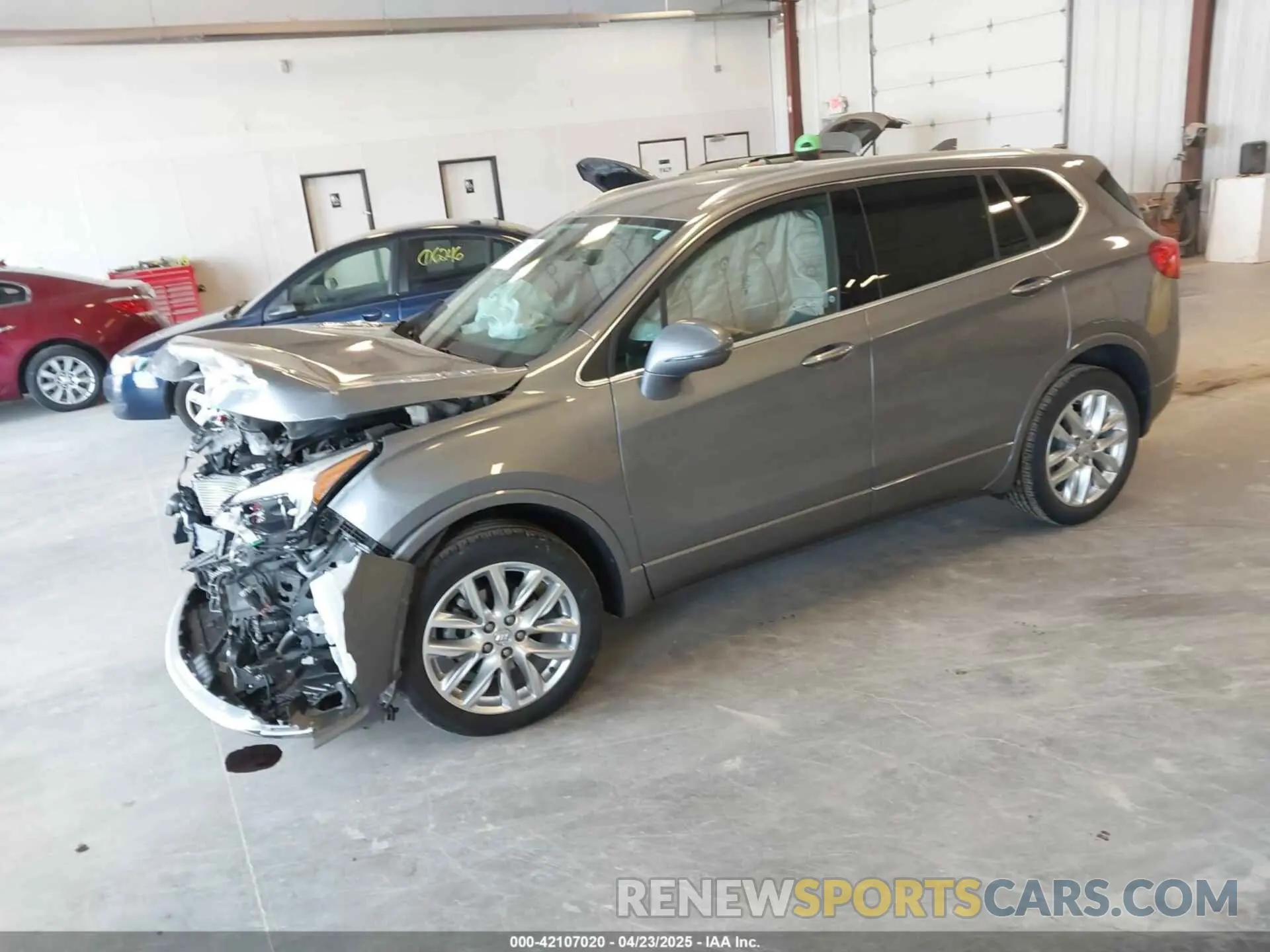 2 fotografías del automóvil dañado LRBFX3SX0LD148386 BUICK ENVISION 2020