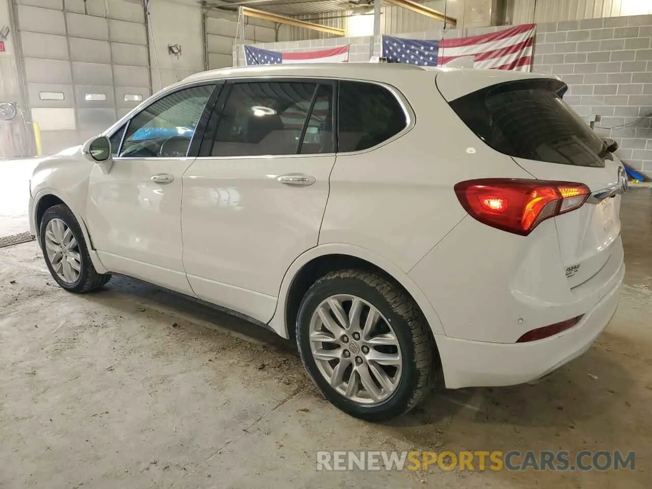 2 fotografías del automóvil dañado LRBFX4SX3LD066612 BUICK ENVISION 2020
